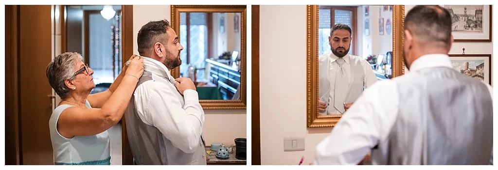 Lo sposo si annoda la cravatta durante i preparativi — fotografo matrimonio Roma